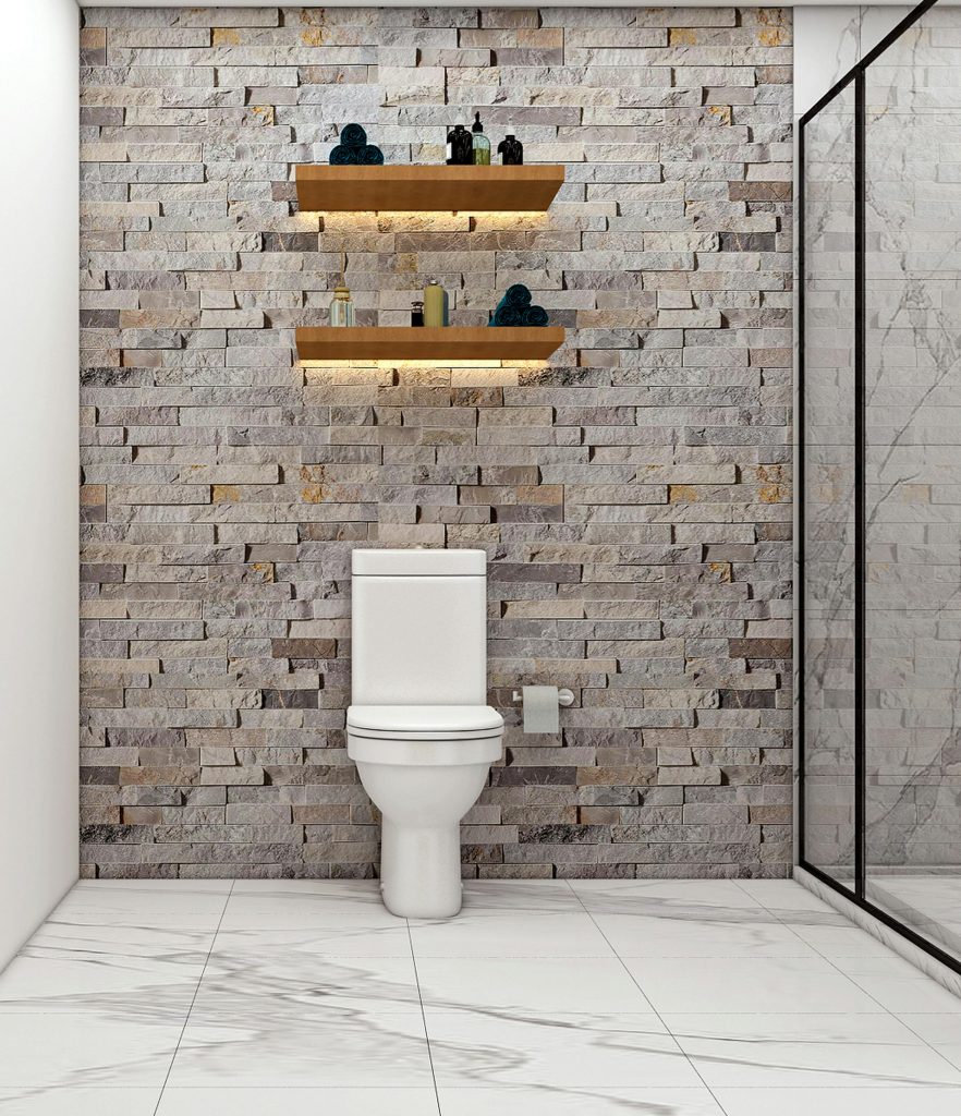 Detalle de pared con textura natural siguiendo la tendencia de earth tones y materiales brutos